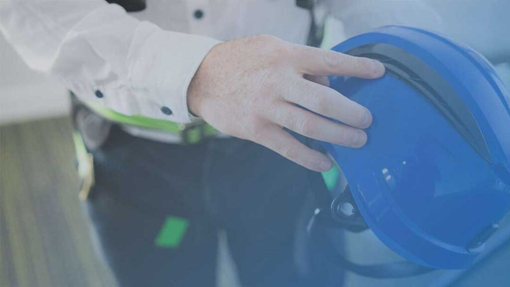 Man Holding a Hard Hat